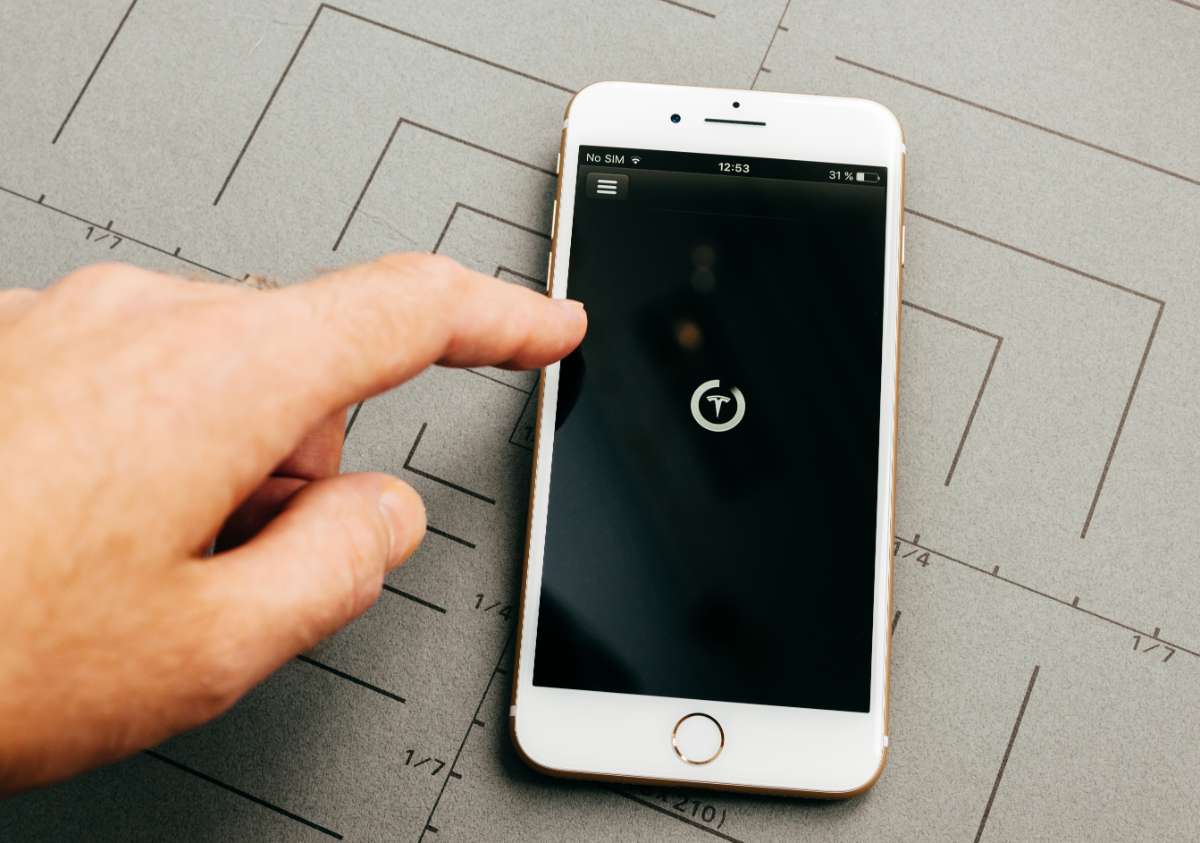 tesla cell phone app updating