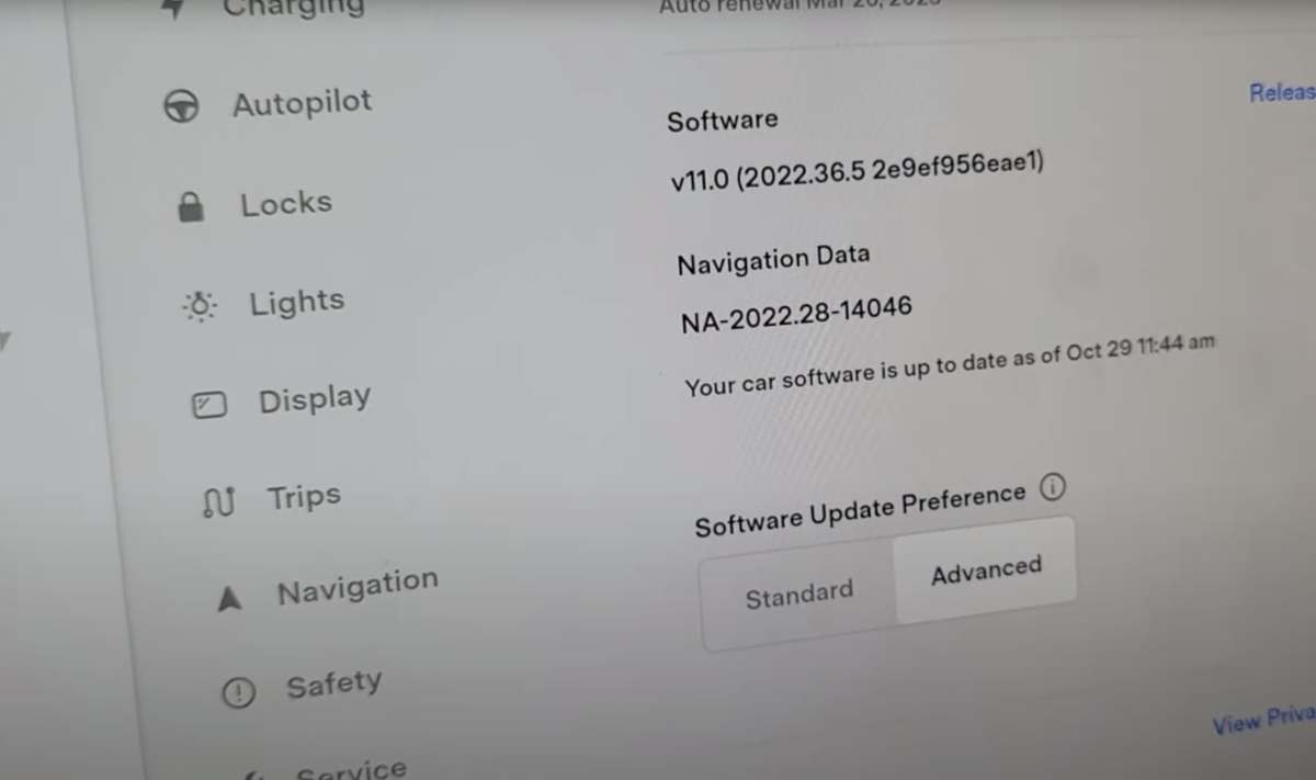 photo of tesla touchscreen showing software update